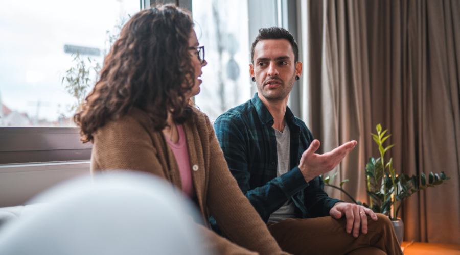 Is couples therapy for addiction covered by insurance concept pic shows man and his wife in heated conversation during therapy