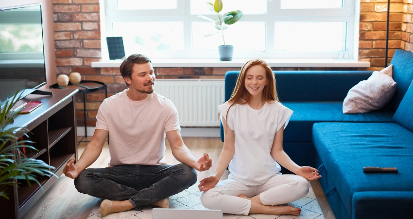 Image of a couple practicing mindfulness together in a holistic therapy setting